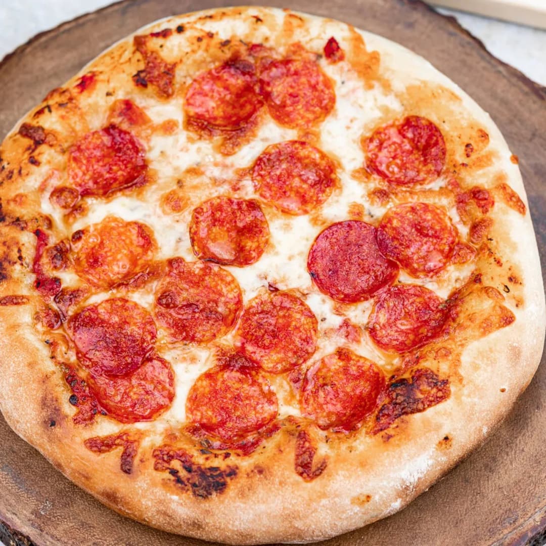 Jak zrobić miękkie ciasto na pizzę? Proste triki, które zawsze działają